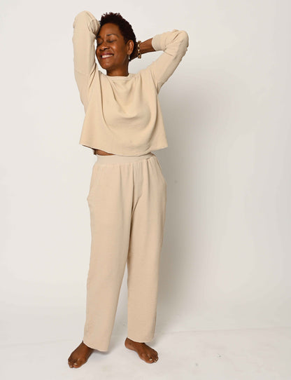 full body of organic thermal long sleeve and wide leg pant in sand beige