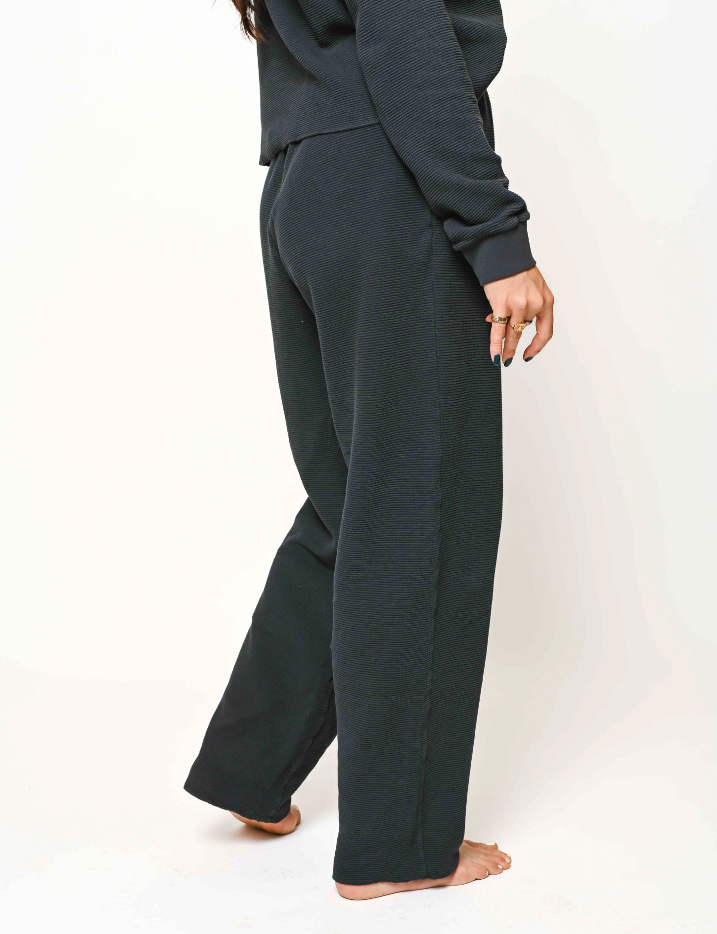 close up view of the organic thermal wide leg pant with pockets in vintage black